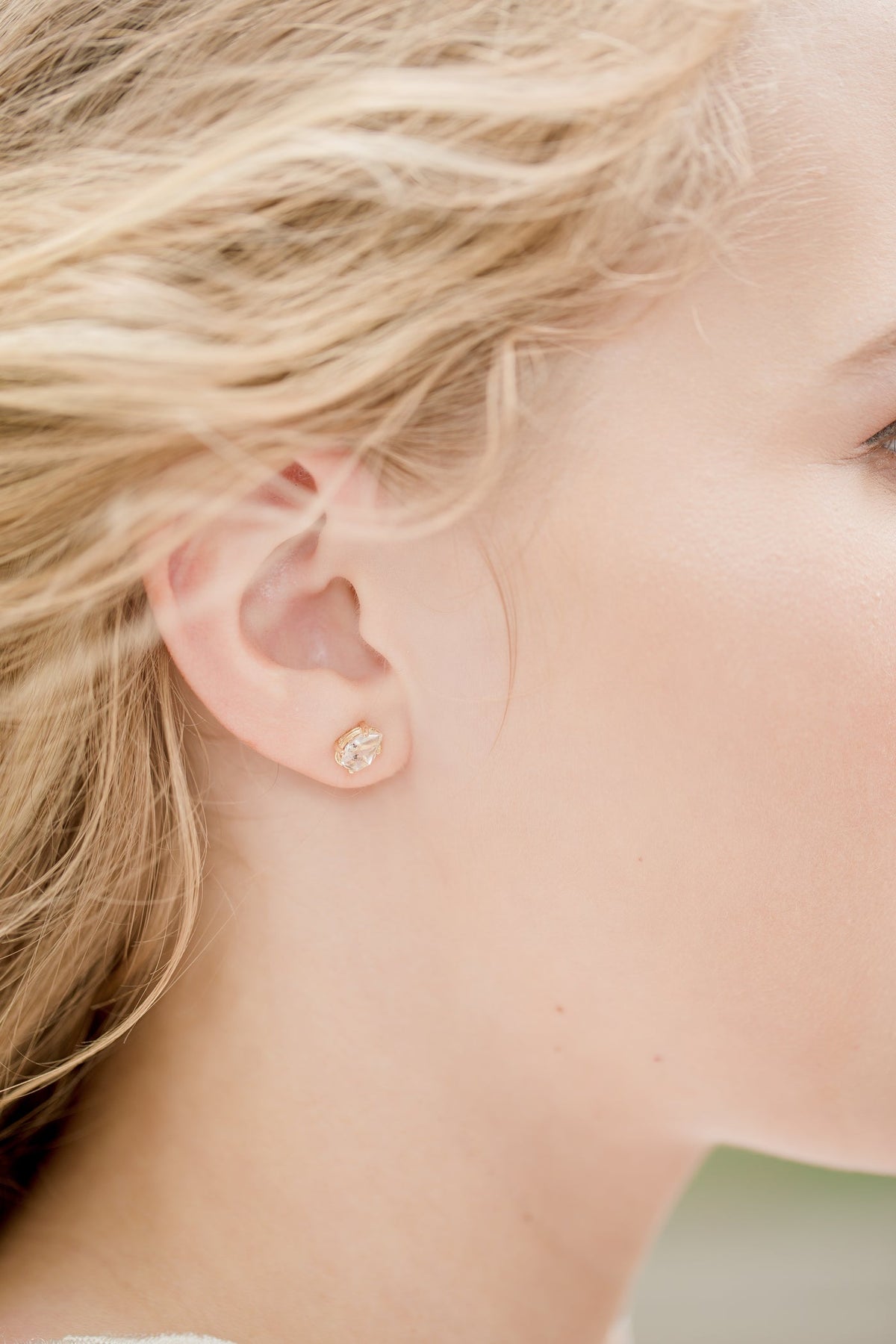 Hoop earrings worn