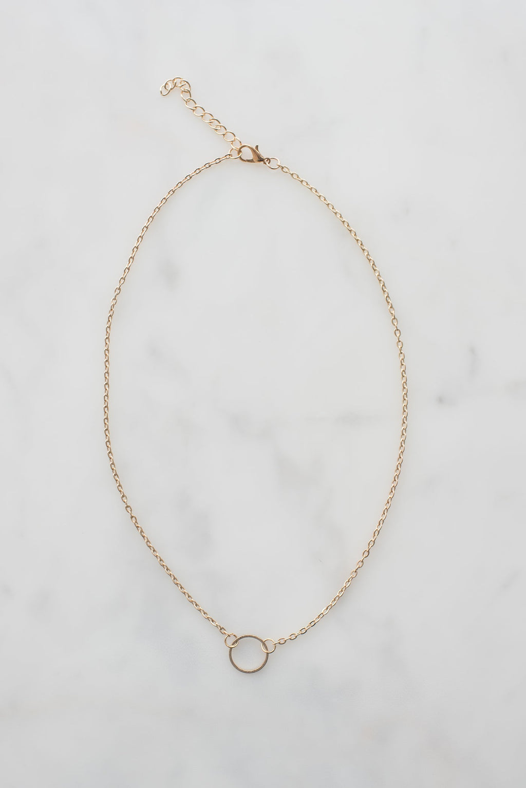 Fine stainless steel chain necklace laid flat
