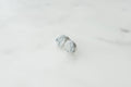 Pearl stud earrings on white