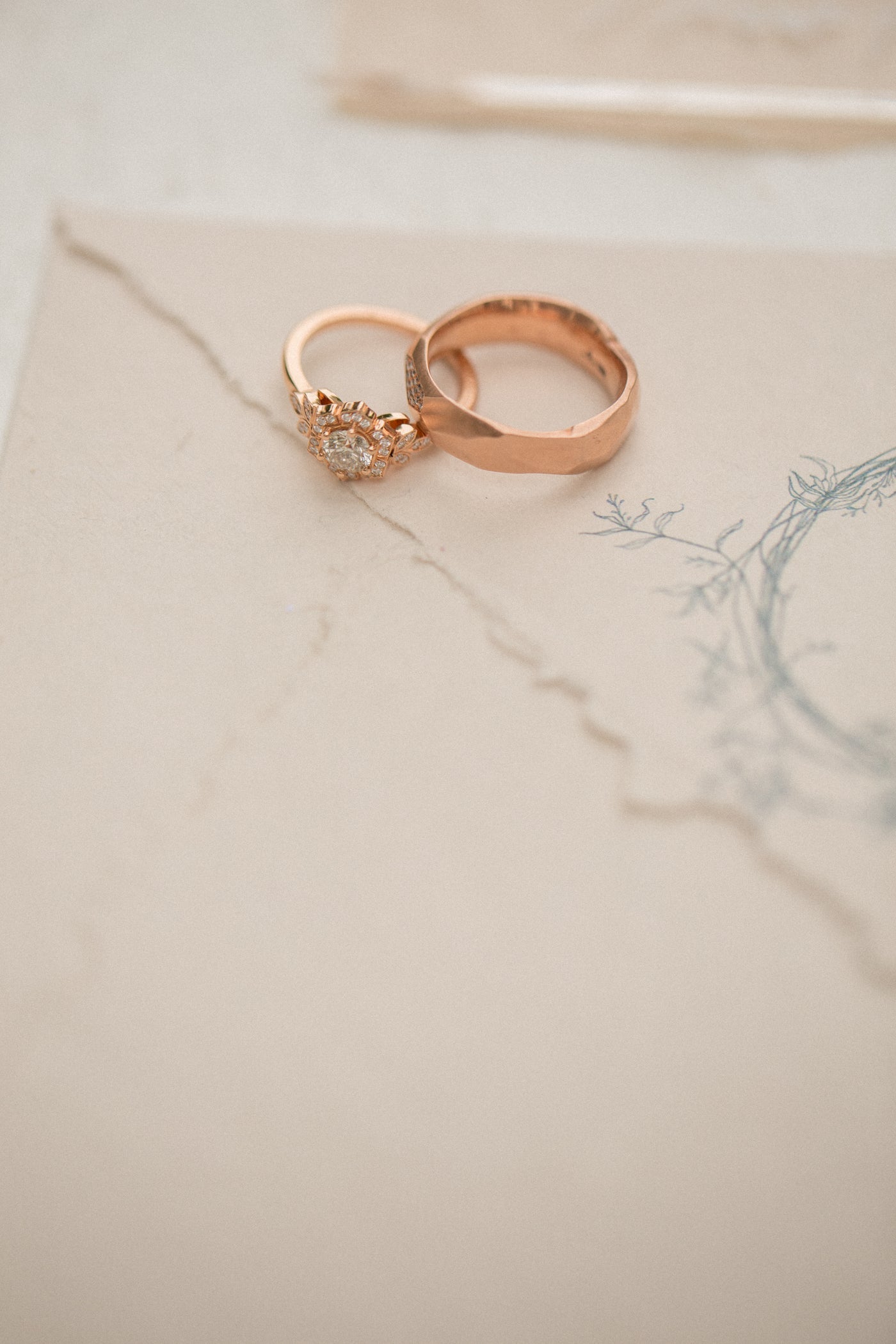 Polished steel band ring on white marble