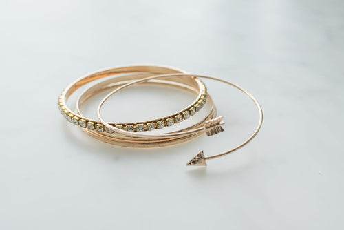 Chain bracelet stacked with others
